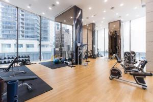 a gym with exercise equipment in a building at Atelier Bukit Bintang in Kuala Lumpur