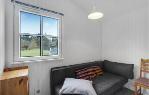 Area soggiorno di 3 Bedroom Beautiful Home In Højslev