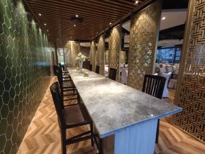 Restoran või mõni muu söögikoht majutusasutuses Guangzhou Good International Hotel