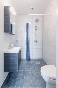 Koupelna v ubytování Posti Guesthouse