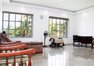 אזור ישיבה ב-Finca Hotel Villa Gladys en Mesitas del Colegio