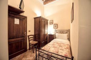 Postel nebo postele na pokoji v ubytování Corte Dell' Oca