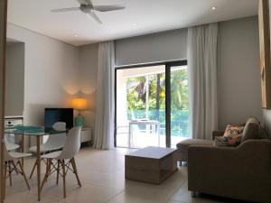Et opholdsområde på Montecrista Appart moderne et cosy, 1 chambre à 2 min plage Pereybere