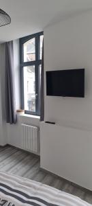 Televízia a/alebo spoločenská miestnosť v ubytovaní air cosy valenciennes gare activité illégales interdit