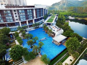 an aerial view of a resort with a large swimming pool at The Yun Resort QingYuan in Qingyuan