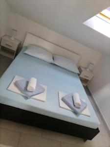 Postel nebo postele na pokoji v ubytování Apartman Sutalo