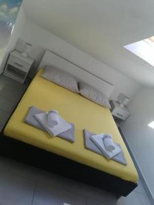 Postel nebo postele na pokoji v ubytování Apartman Sutalo