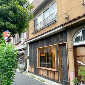 a building with windows on the side of a street at 旧邸稽古場 in Tokyo