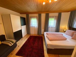 Postel nebo postele na pokoji v ubytování Haus Stabentheiner