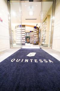 a lobby with a wellness sign on the floor of a building at QuintessaHotel TokyoHaneda Comic&Books in Tokyo