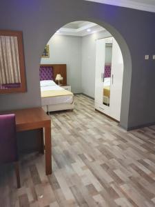 Postel nebo postele na pokoji v ubytování EYFEL HOTEL