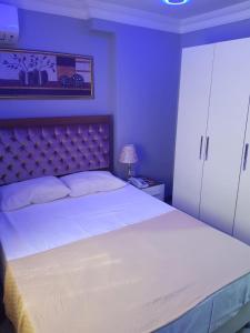 Postel nebo postele na pokoji v ubytování EYFEL HOTEL