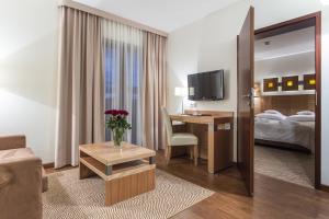 Postel nebo postele na pokoji v ubytování Hotel Zbójnicówka