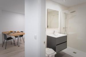 Koupelna v ubytování Apartamentos Soria Suites