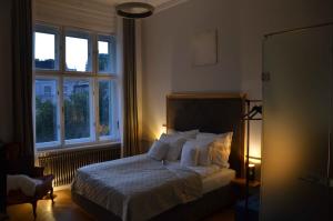 Postel nebo postele na pokoji v ubytování Bartók Classic Apartment