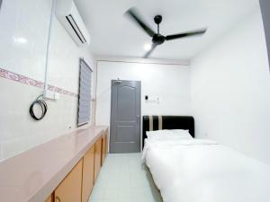 Venice Guest Hostel - Bilik Sahaja客房内的一张或多张床位