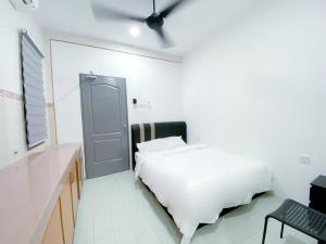 Venice Guest Hostel - Bilik Sahaja客房内的一张或多张床位