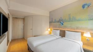 ibis Thane - An Accor Brand客房内的一张或多张床位