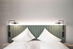 Postelja oz. postelje v sobi nastanitve Stadthotel Goldenes Schiff