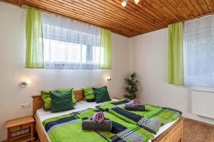 Postel nebo postele na pokoji v ubytování Am Sersbach