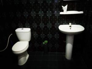Koupelna v ubytování ASK Homestay + 37 fotografií