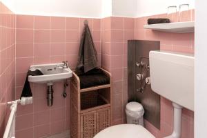 Koupelna v ubytování Arkadia - Ferienwohnung - Uhlandweg + 4 fotografie