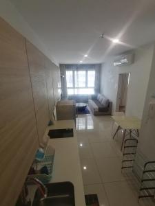 a living room with a couch and a table at [SLEEPS 4 PAX] @ I-CITY in Shah Alam