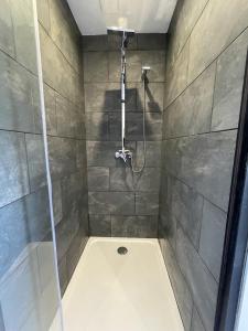 a bathroom with a shower with a shower at Chaleur Moderne des Pyrénées in Argelès-Gazost +12 photos