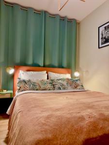 Posteľ alebo postele v izbe v ubytovaní MiłoMi Apartamenty Kołobrzeg