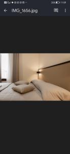 a picture of a bed in a room at Locanda del vecchio mulino in Fiorano Modenese