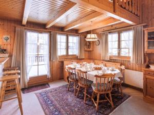 a large dining room with a table and chairs at Chalet Eloise by Interhome in Nendaz