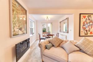 a living room with a couch and a table at Dene Annexe, Durham in Shincliffe