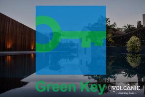 a picture of a pool with the words green key collaborative at Volcanic Charming House in Ribeira Grande