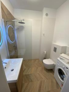 Kúpeľňa v ubytovaní Apartamenty Centrum Poznańska - Biały