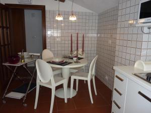 A television and/or entertainment centre at Casa Corte delle Ancore