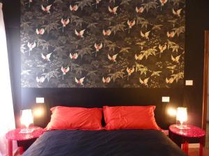 A bed or beds in a room at Casa Corte delle Ancore