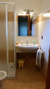 Koupelna v ubytování Bed&Breakfast L'Oasi