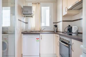 Kuchyň nebo kuchyňský kout v ubytování Vivienda liv El Puerto I 3-11