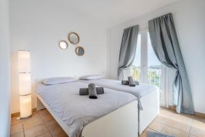 Postel nebo postele na pokoji v ubytování Vivienda liv El Puerto I 3-11 + 16 fotografií