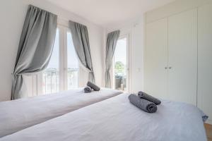 Postel nebo postele na pokoji v ubytování Vivienda liv El Puerto I 3-11