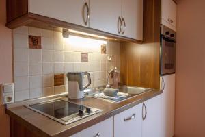 Kuchyň nebo kuchyňský kout v ubytování Ferienhaus Utkiek + 22 fotografií