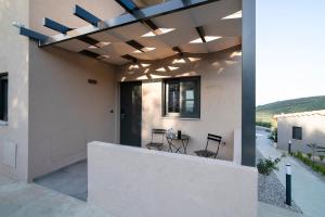 A balcony or terrace at Serenity Suites Sea View Houses