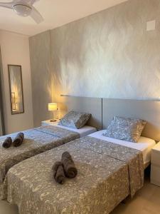 Un pat sau paturi într-o cameră la ALCOTAN 2 Modern apartment with sea view & big sunny terrace