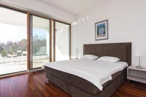 Posteľ alebo postele v izbe v ubytovaní Villa Superior One + 9 fotografií