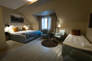 Postel nebo postele na pokoji v ubytování Åtellet Hotell