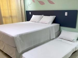 Ein Bett oder Betten in einem Zimmer der Unterkunft Pousada Amada Terra