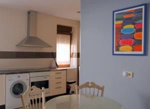 Kuchyň nebo kuchyňský kout v ubytování Casa Rural Reposo de Afanes