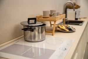 A kitchen or kitchenette at LC Luxury Apartment