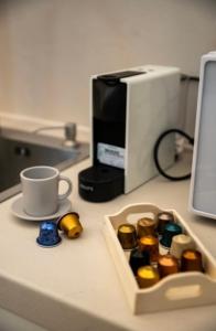 Coffee and tea making facilities at LC Luxury Apartment