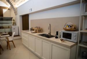 A kitchen or kitchenette at LC Luxury Apartment